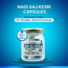 Bottle of Vardhan Nadi Gaj Kesri Capsules highlighting Ayurvedic power for strength, stamina, and energy with 100% natural label.